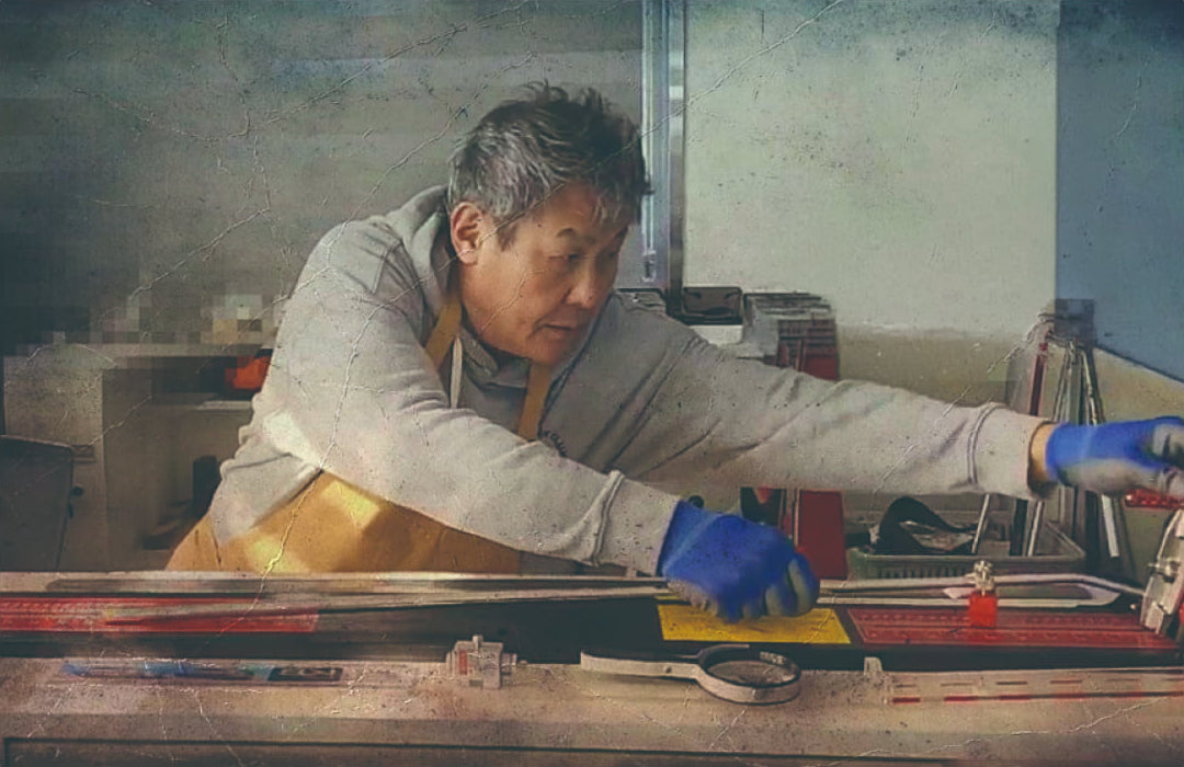Kwang Nam Kim at the workbench