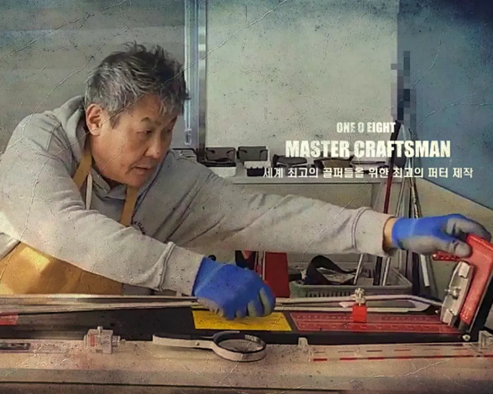 Master Craftsman Kwang Nam Kim precision assembling a One O Eight CNC milled putter to solve distance control and directional errors based on 38 years of expertise.